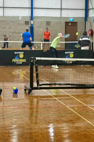 Bayside members rallying across the indoor pickleball courts
